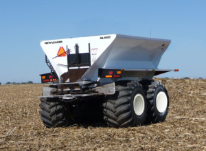 Tow-behind compost spreader