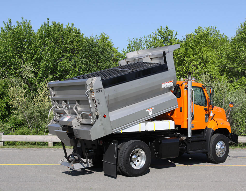 XT3 Type III Multi-Purpose Dump Body with hauling capabilities, pre-wetting, and salt spreading.